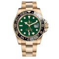 GMT-Master II 116718LN 40mm Gold Green Dial 1
